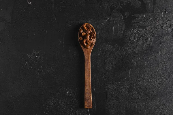 Coffee Beans Spoon Lie Wooden Background — Stock Photo, Image