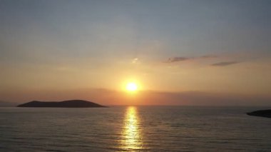 aerial shot of sunset over the sea