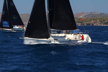 Bodrum,Turkey. 25 May 2019: Sailboats sail in windy weather in the blue waters of the Aegean Sea, on the shores of the famous holiday destination Bodrum.