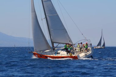 Bodrum,Turkey. 25 May 2019: Sailboats sail in windy weather in the blue waters of the Aegean Sea, on the shores of the famous holiday destination Bodrum.