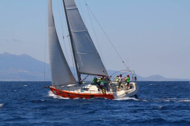 Bodrum,Turkey. 25 May 2019: Sailboats sail in windy weather in the blue waters of the Aegean Sea, on the shores of the famous holiday destination Bodrum.