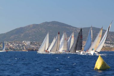Bodrum,Turkey. 25 May 2019: Sailboats sail in windy weather in the blue waters of the Aegean Sea, on the shores of the famous holiday destination Bodrum.