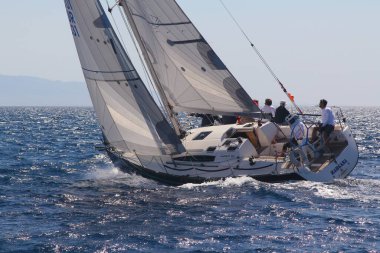 Bodrum,Turkey. 25 May 2019: Sailboats sail in windy weather in the blue waters of the Aegean Sea, on the shores of the famous holiday destination Bodrum.