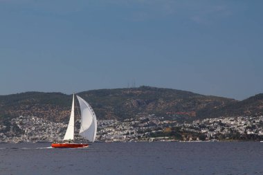Bodrum,Turkey. 25 May 2019: Sailboats sail in windy weather in the blue waters of the Aegean Sea, on the shores of the famous holiday destination Bodrum.