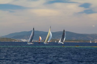 Bodrum,Turkey. 26 May 2019: Sailboats sail in windy weather in the blue waters of the Aegean Sea, on the shores of the famous holiday destination Bodrum.