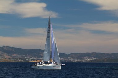 Bodrum,Turkey. 26 May 2019: Sailboats sail in windy weather in the blue waters of the Aegean Sea, on the shores of the famous holiday destination Bodrum.