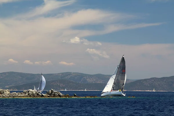 Bodrum,Turkey. 26 May 2019: Sailboats sail in windy weather in the blue waters of the Aegean Sea, on the shores of the famous holiday destination Bodrum.
