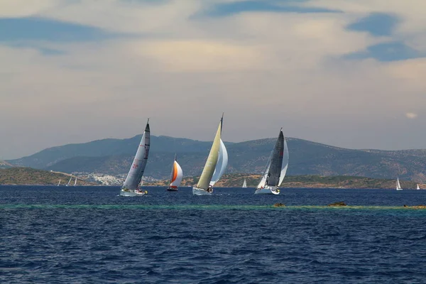 Bodrum,Turkey. 26 May 2019: Sailboats sail in windy weather in the blue waters of the Aegean Sea, on the shores of the famous holiday destination Bodrum.