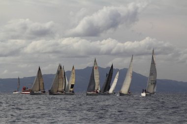 Bodrum,Turkey. 19 January 2019: Sailboats sail in windy weather in the blue waters of the Aegean Sea, on the shores of the famous holiday destination Bodrum.