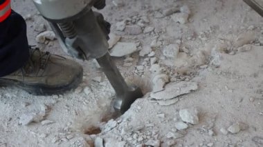 Debris study in earthquake drill. The building base is drilled with special drills. Emergency action to save lives.