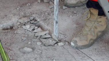 Debris study in earthquake drill. The building base is drilled with special drills. Emergency action to save lives.