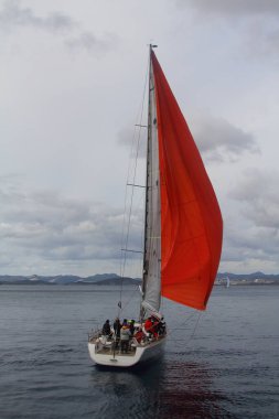 Bodrum,Turkey. 19 January 2019: Sailboats sail in windy weather in the blue waters of the Aegean Sea, on the shores of the famous holiday destination Bodrum.