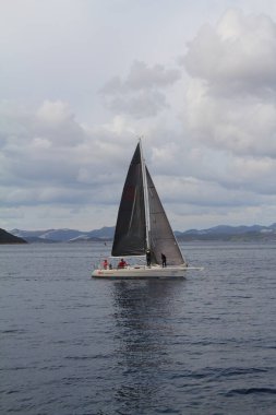 Bodrum,Turkey. 19 January 2019: Sailboats sail in windy weather in the blue waters of the Aegean Sea, on the shores of the famous holiday destination Bodrum.