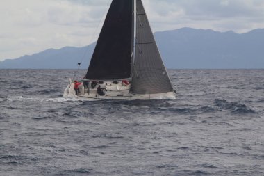 Bodrum,Turkey. 19 January 2019: Sailboats sail in windy weather in the blue waters of the Aegean Sea, on the shores of the famous holiday destination Bodrum.