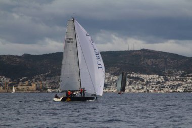 Bodrum,Turkey. 19 January 2019: Sailboats sail in windy weather in the blue waters of the Aegean Sea, on the shores of the famous holiday destination Bodrum.