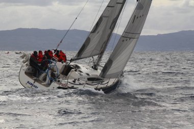 Bodrum,Turkey. 19 January 2019: Sailboats sail in windy weather in the blue waters of the Aegean Sea, on the shores of the famous holiday destination Bodrum.