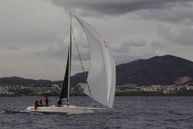 Bodrum,Turkey. 19 January 2019: Sailboats sail in windy weather in the blue waters of the Aegean Sea, on the shores of the famous holiday destination Bodrum.