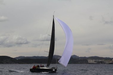 Bodrum,Turkey. 19 January 2019: Sailboats sail in windy weather in the blue waters of the Aegean Sea, on the shores of the famous holiday destination Bodrum.