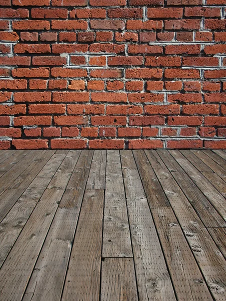 Wooden floor and brick wall. — Stock Photo, Image