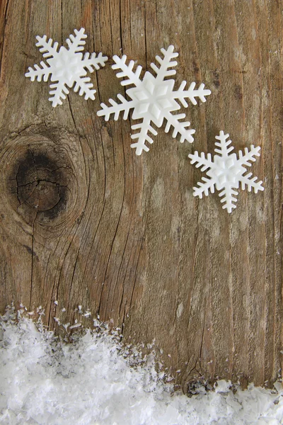 Flocos de neve em madeira — Fotografia de Stock