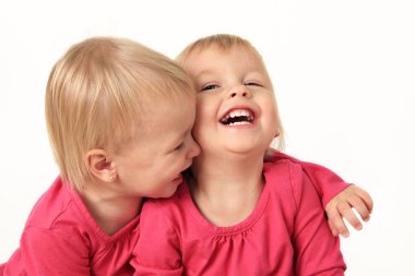 Little twin girls laughing clipart