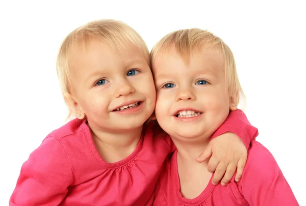 Little twin girls hugging — Stock Photo, Image