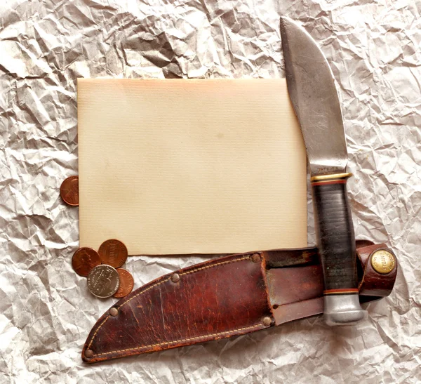 Knife, paper and coins — Stock Photo, Image