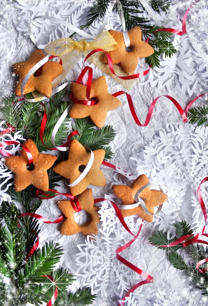Christmas background with cookies, fir-tree branches and snowflake — Stock Photo, Image