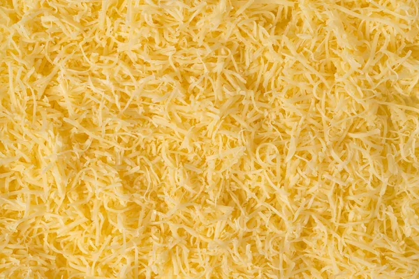 Textura Fundo Queijo Ralado Queijo Ralado Amarelo Fechar Acima Vista — Fotografia de Stock