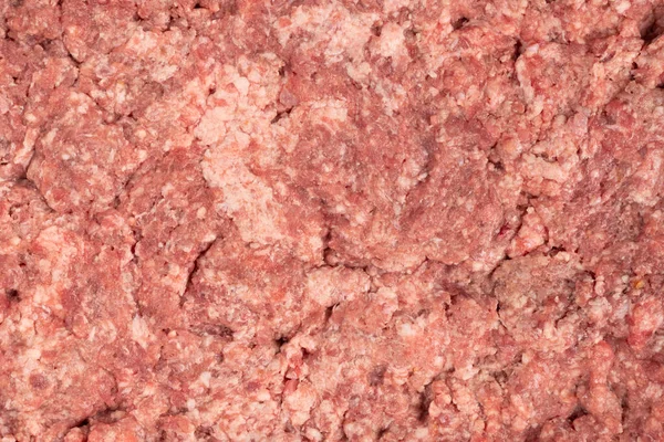 生のミンチ肉質の背景 肉の背景を切り取った 新鮮な豚ひき肉のヒープ トップ表示 — ストック写真