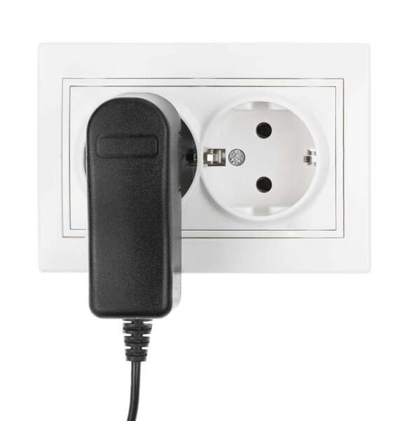 Double power European electric plug isolated on a white. Black electric cord plugged into a white electricity socket on white background