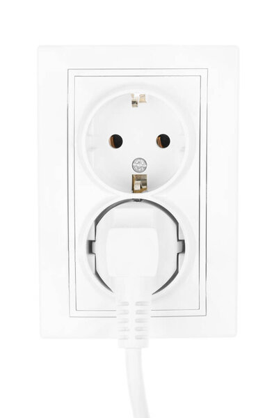 Double power European electric plug isolated on a white. electric cord plugged into a white electricity socket on white background