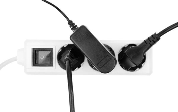 power European electric plug isolated on a white.  electric cord plugged into a white electricity socket on white background