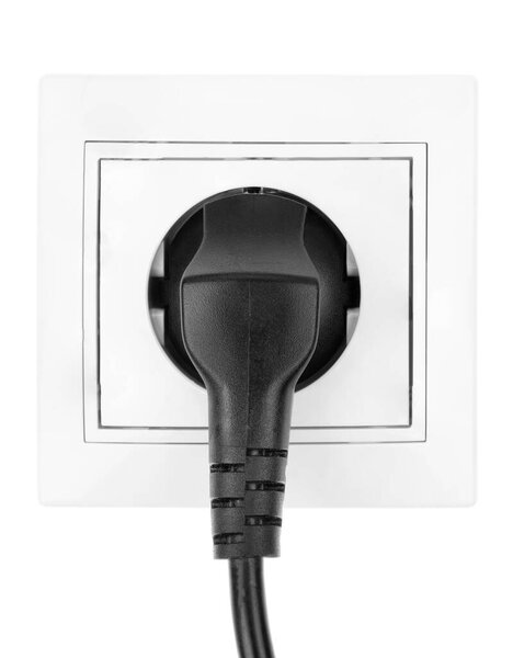 Power European electric plug isolated on a white. black electric cord plugged into a white electricity socket on white background