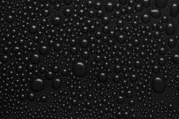 Krople Wody Czarnym Tle Tekstury Ciemne Szkło Pokryte Kroplami Wody — Zdjęcie stockowe