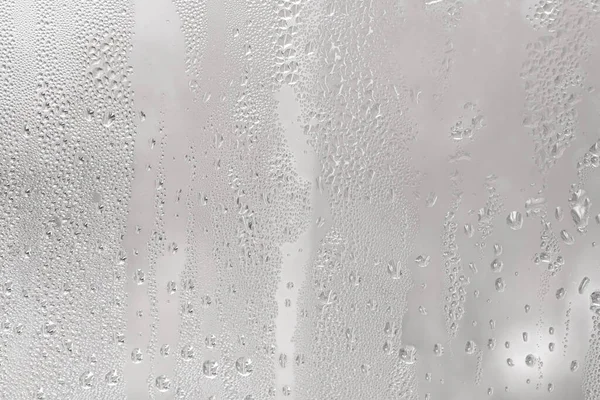 水滴在窗户的背景纹理上 窗户上的冷气 — 图库照片
