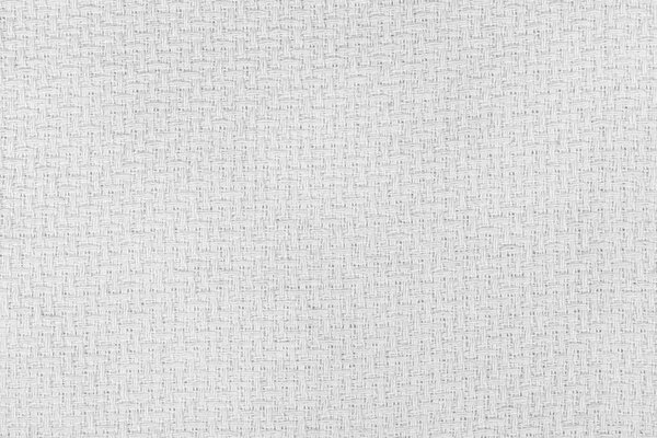White natural texture of knitted wool textile material background. White crochet cotton fabric woven canvas texture. close up