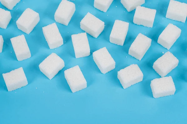 Přírodní Bílý Cukr Kostky Izolované Modrém Pozadí — Stock fotografie