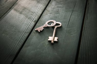 pair of key on the wooden table backgroun