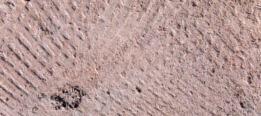 Kahverengi kolonda sert taş duvarın arkaplanı