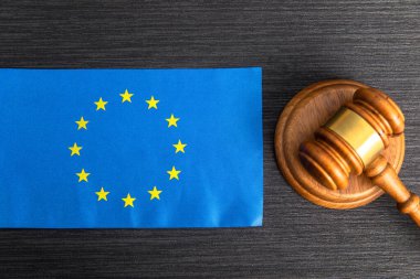Judge gavel and European Union flag. Legality concept