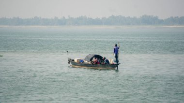 The largest river in Bangladesh is the Padma. The message of the arrival of the monsoon. Fishermen are catching hilsa fish by boat. Photo was taken from Paturia Ferry Ghat-Bangladesh.