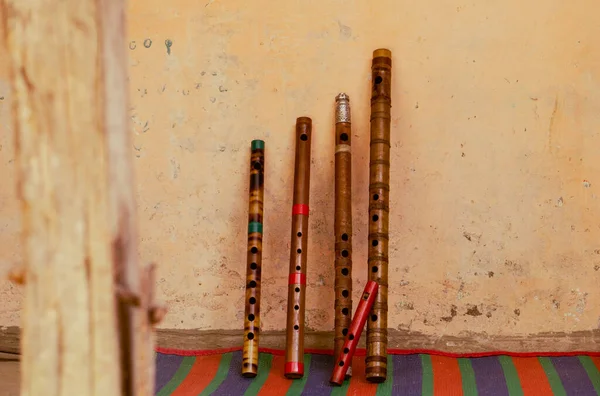 Flute of Bangladesh. Handmade bamboo flute. The flutes are arranged in rows.