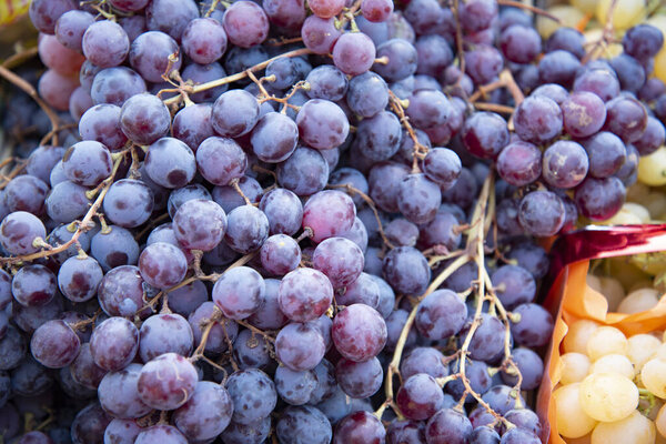 full frame shot of red grapes on market for background