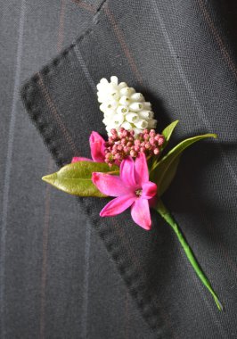 A Buttonhole of Muscari, Hyacinth petals and Anemone clipart