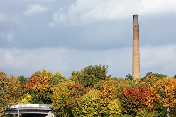 Industrial chimney in the fall — Stock Photo, Image