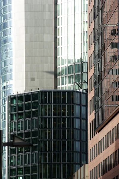 Lantern in front of skyscrapers — Stock Photo, Image