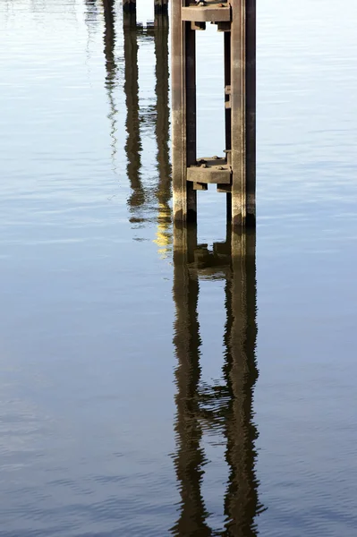 Steel piers in the water — Stock Photo, Image
