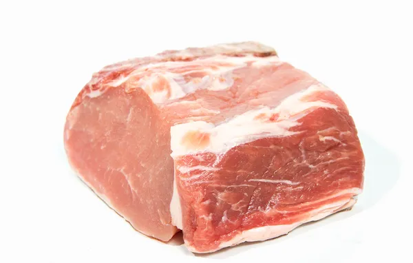 Čerstvé vepřové maso na bílém pozadí. Stock Snímky