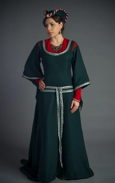 Beautiful young girl in a historical dress — Stock Photo, Image